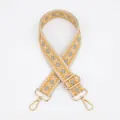 Close-up of geometric jacquard shoulder strap with golden metal lobster clasps and buckle - A-8 Khaki Yellow Grey Diamond