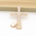 Close-up of golden cross pendant with sparkling rhinestones and drop-shaped crystal - Gold (Clear Rhinestones)