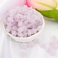 Frosted purple acrylic flower beads for DIY jewelry making in a white ceramic bowl - Purple Frosted Star (83pcs)
