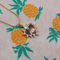 Gouden hartketting met zwart emaille 'evil eye' hanger en heldere kristallen - 50VM Slangenketting / Zwart
