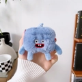 Detail of blue plush monster earphone case with embroidery and 3D limbs for AirPods - Blue Plush Monster Showing Teeth / AirPods 1/2 Gen