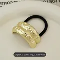 Elastic hair tie with textured gold metal plate and durable black rubber band - Golden Pleated Double-row Arc