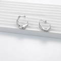 Irregular silver C-shape earrings with hammered lava texture in minimalist style - Silver Irregular Lava Style (KLD3397)