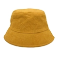 Macro shot of ginger yellow corduroy texture and vertical ribs on bucket hat fabric - Yellow