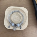 Silver braided stainless steel bracelet featuring blue glitter beads and dreamcatcher pendant - Fluorescent Net Bracelet