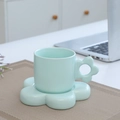 Light blue ceramic coffee cup and saucer set with cute floral handle and base - Flower Cup & Saucer - Mint Green