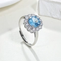 Luxe verstelbare zilveren ring met ronde blauwe spinel en schitterende halo-stenen - Blauwe Spinel 106 - Zilver