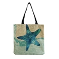 Beige canvas tote bag with teal gradient starfish print and black handles - Blue Starfish and Ocean Style Pattern (hm4538b)