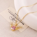 Golden titanium necklace featuring a pink round stone and diamond-set deer horn charms - XL1956 Pink Zircon Wings Deer Horn Gold