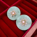 Detail of vintage mint green resin stud earring with starburst zircon and pearl core - Flower Petal Round (HE20342) / Mint Green