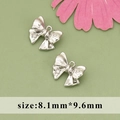Silver bow pendant accessories with zircon inlay, size 8.1mm by 9.6mm for jewelry making - ME5601B - Silver Bow Knot - 1pc