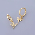Macro detail of gold-plated silver dragonfly earrings with cubic zirconia stones - Dragonfly Gold