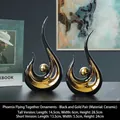 Abstract ceramic phoenix statues in black and gold finish for modern home decor - Phoenix Flight - Black Gold Pair