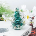 Mini sapin de Noël en résine vert foncé et marron décoratif sur un livre - 44 Agate verte