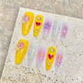 Handmade stiletto press-on nails featuring 3D lollipop, heart, and star charms in summer colors - Extra Small (XS) / 1917 Long Almond