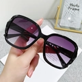 Chic black oversized square sunglasses with purple gradient lenses and geometric cutout arms - Bright Black