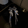 Sparkling tassel earrings featuring rhinestone hearts and wheat motifs with starburst effect - Silver Needle Heart Tassel