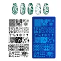 Macro shot of stainless steel nail plate featuring Christmas deer and snowflake patterns - Christmas Style 02 (MANZILIN-02)