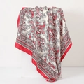 Red and beige paisley satin scarf draped on cube showing glossy silk-like texture - 90*90cm / Red