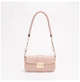 Close-up of pink crocodile texture leather with gold metal clasp and chain strap detail - Pink