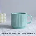 Light blue ceramic mug with vertical stripes, 260ml capacity on white lace tablecloth - Nile Blue (Set of 6)
