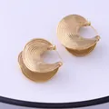 Golden liquid lava textured crescent earrings with elegant horizontal wave pattern - Gold XLEH041 (Spiral Arc)
