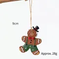 Gingerbread man Christmas ornament with black hat and green overalls, 9cm hanging decor - Pants Gingerbread Man