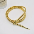 Close-up of gold snake metal chain with detailed scale texture for waist or neck - Gold