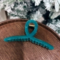 Teal claw clip with gold spring displayed on a wooden tray with cedar branches - 13cm / Hanger Claw