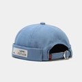 Berretto docker azzurro con etichetta tessuta e fibbia in metallo regolabile in lino e cotone - Regolabile / Blu Nebbia
