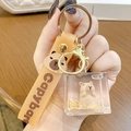 Capybara keychain with orange silicone strap and yellow quicksand oil acrylic cube - Square Capybara - Standing