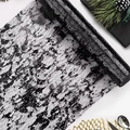 Elegant black lace table runner with gold foil mesh pattern for festive table decor - Black