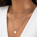 Detailed view of triple-layered silver necklace featuring a smooth round pendant on a model - Silver-Simple Round Disc Pendant