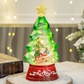 Christmas tree snow globe music box with LED lights and Santa Claus figurines - Santa Claus Style