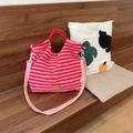 Fuzzy striped tote bag with red and pink plush fabric and adjustable shoulder strap - Pink Stripe