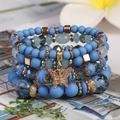 Boho-Mehrschicht-Perlenarmband-Set mit blauen Marmorperlen und goldenem Schmetterling - Tintenblau