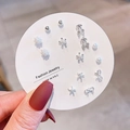 Close-up of silver stud earring set with pearls, zircons and delicate bow-knot designs - Silver Cherry Snowflake Set (E0034-1)