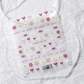 Purple nail art stickers featuring hearts and daisy patterns on a 3D adhesive sheet - Purple Charm (TS-2383)