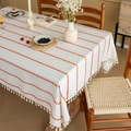 Cream rectangular tablecloth with orange geometric stripes and elegant fringe tassels - Orange and White Stripes