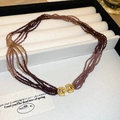 Multi-strand purple gradient beaded necklace with gold diamond-set interlocking clasp - 16# Multi-strand Beaded Deep Purple Gradient Necklace / Deep purple