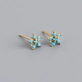 Macro detail of gold flower stud earrings with seven sky blue turquoise gemstones - Style D (Gold)