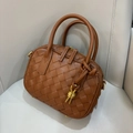 Brown woven leather mini handbag with knotted handle detail and gold hardware - Caramel color