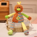 Colorful patchwork duck plush toy with long legs in a cozy wicker basket setting - Bird / 30cm (0.18kg)