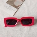 Fashionable red rectangular sunglasses with dark lenses and glossy plastic frames - Red