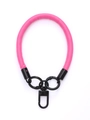 Close-up of pink leather phone wrist strap with black metal spring rings and swivel hook - Pink