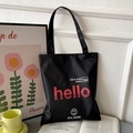 Black Oxford canvas tote bag with graphic letter print and shoulder straps - Black with Hello Smile Print