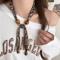 Detail of leopard print scarf necklace with amber beads and dark brown teardrop pendant - 9# Necklace-Leopard