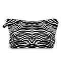 Detail of a zebra print makeup bag featuring a black zipper and small side carry handle - Zebra Print