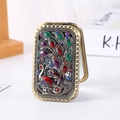 Vintage bronze folding makeup mirror with ornate peacock pattern and gemstone inlay - Bronze Side Tail Peacock