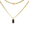 Detailed close-up of gold snake chain with a rectangular black gemstone pendant - Black Zirconia - Gold Plated